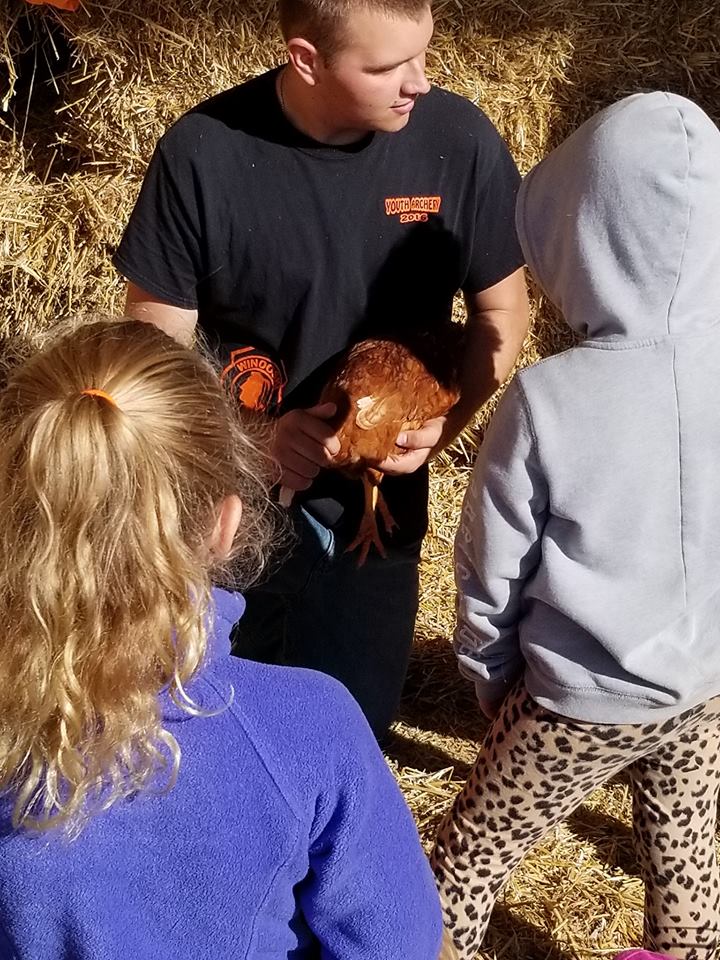 Kiel FFA student holding a chicken